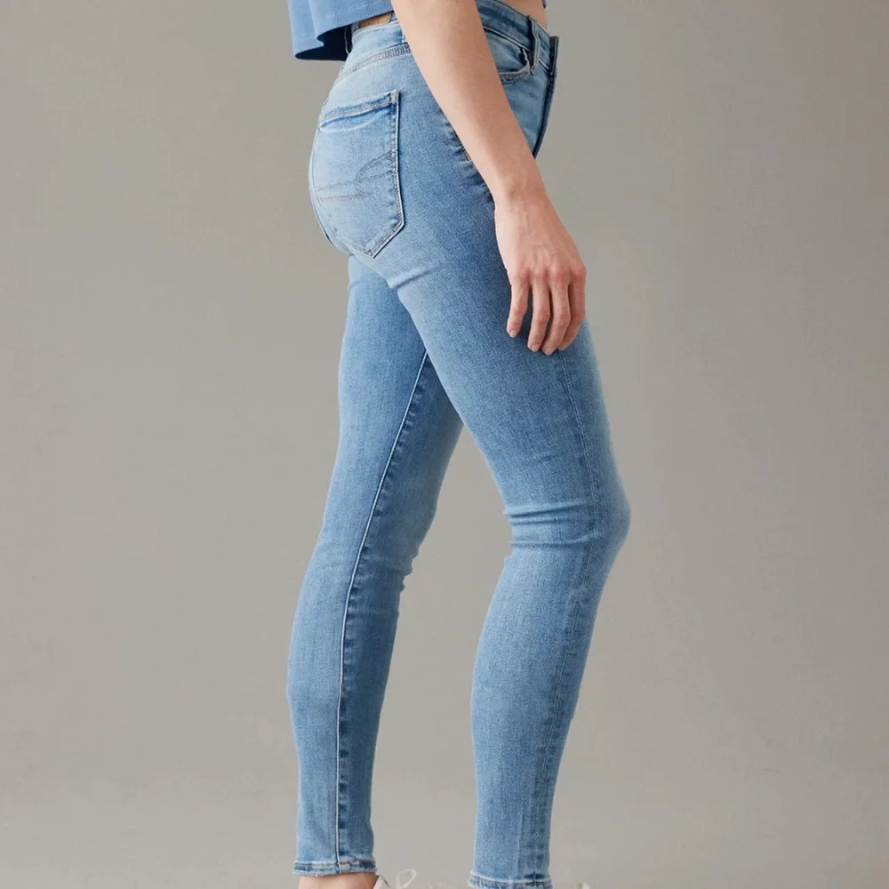 American Eagle Next Level Hi Rise jeans in light wash. Size 10. - Picture 2 of 10